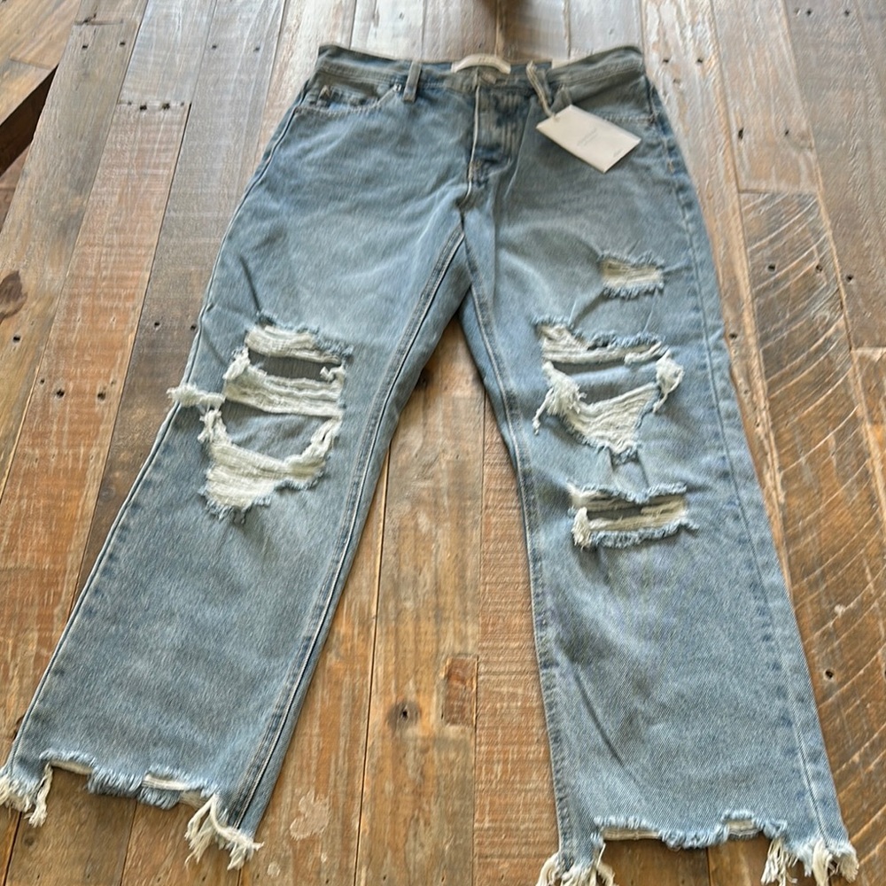 Distressed Blue Jeans
